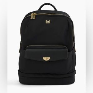 Never used. Perfect for a work or diaper bag with a clutch!